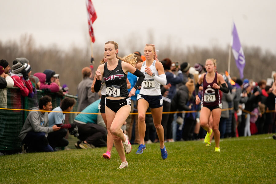 foot race on grass with spectators